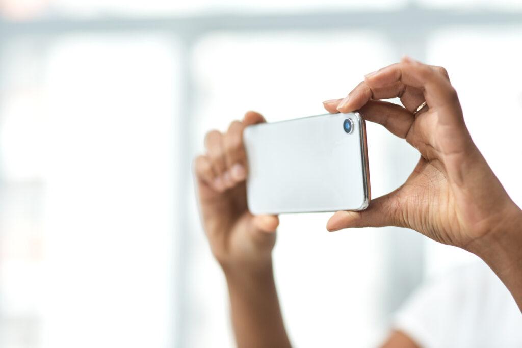 person-taking-picture-with-smartphone