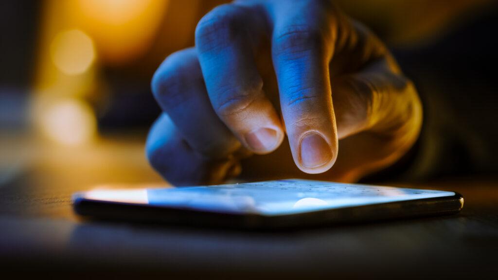 hand-typing-message-on-smartphone