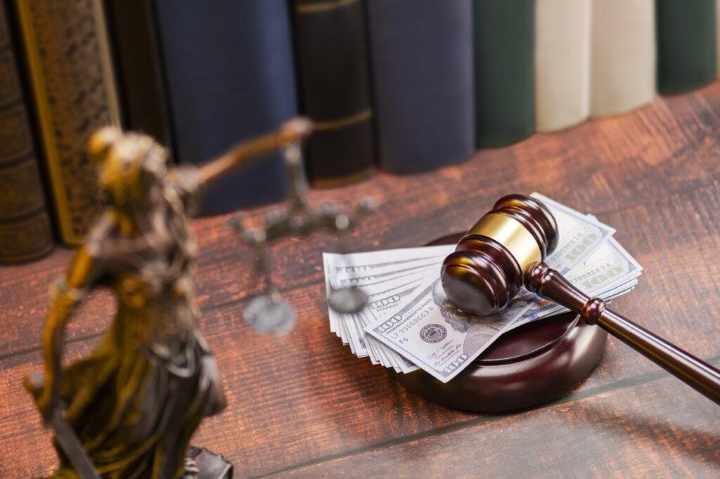 Gavel with cash.